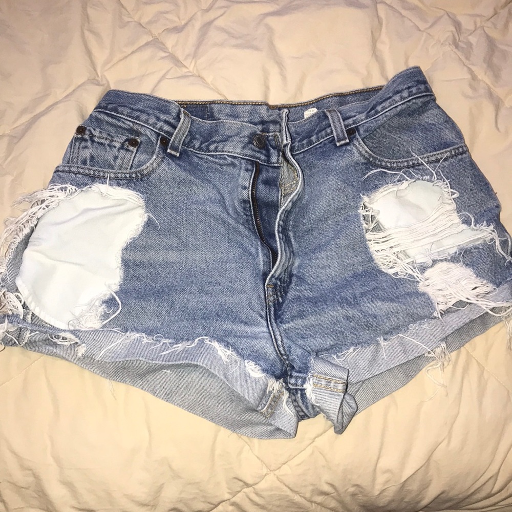Super distressed Levi denim shorts